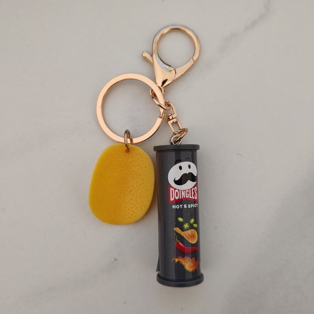 سلسلة مفاتيح رقاقة البطاطس الإ - مراجعة Gaming Console Keychain وسعره